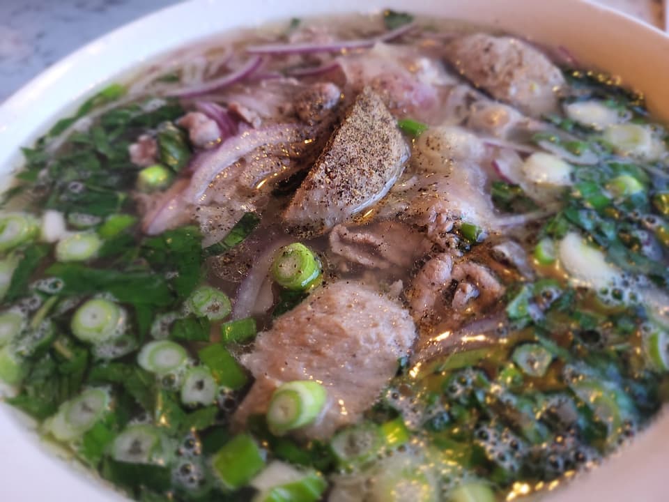 Nhớ Saigòn - “Nhớ Sài Gòn – Vietnamese Pho & Cuisine | 17 Ave SW Calgary” — dining room photo 1